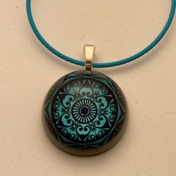 Porte-clés fleur turquoise noire