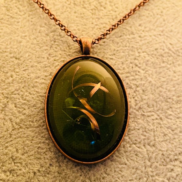 Pendentif vert ovale